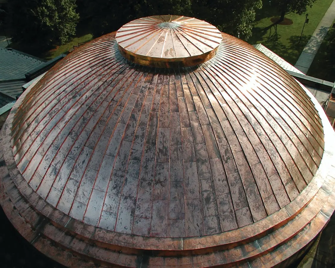 Craftsman Roofing crew installing a new roof in Hamilton